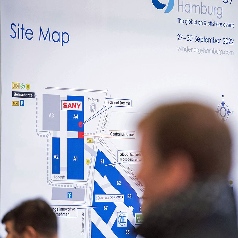WindEnergy Hamburg - Visitors in front of site plan