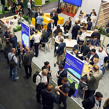 View of the exhibition stands from the escalator in Hall A2