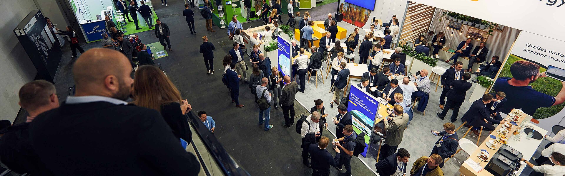 View of the exhibition stands from the escalator in Hall A2